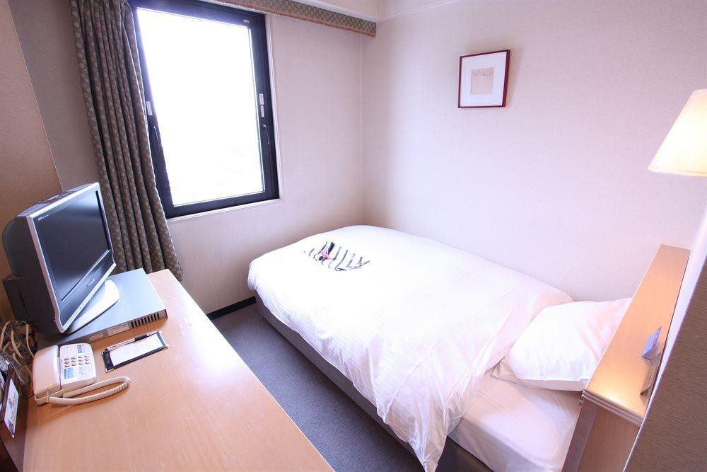 Apa Hotel Tonami Ekimae Kültér fotó