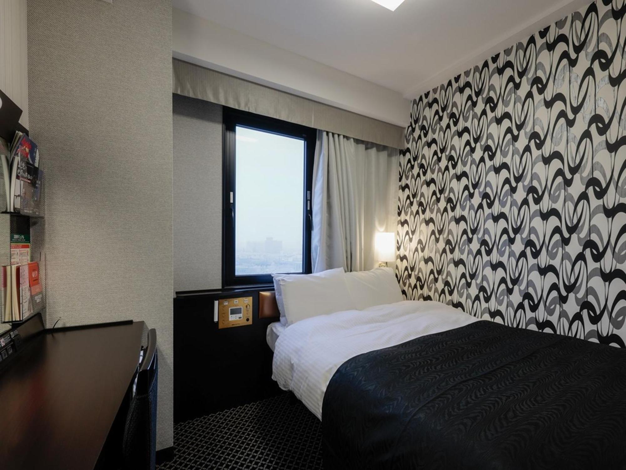 Apa Hotel Tonami Ekimae Kültér fotó