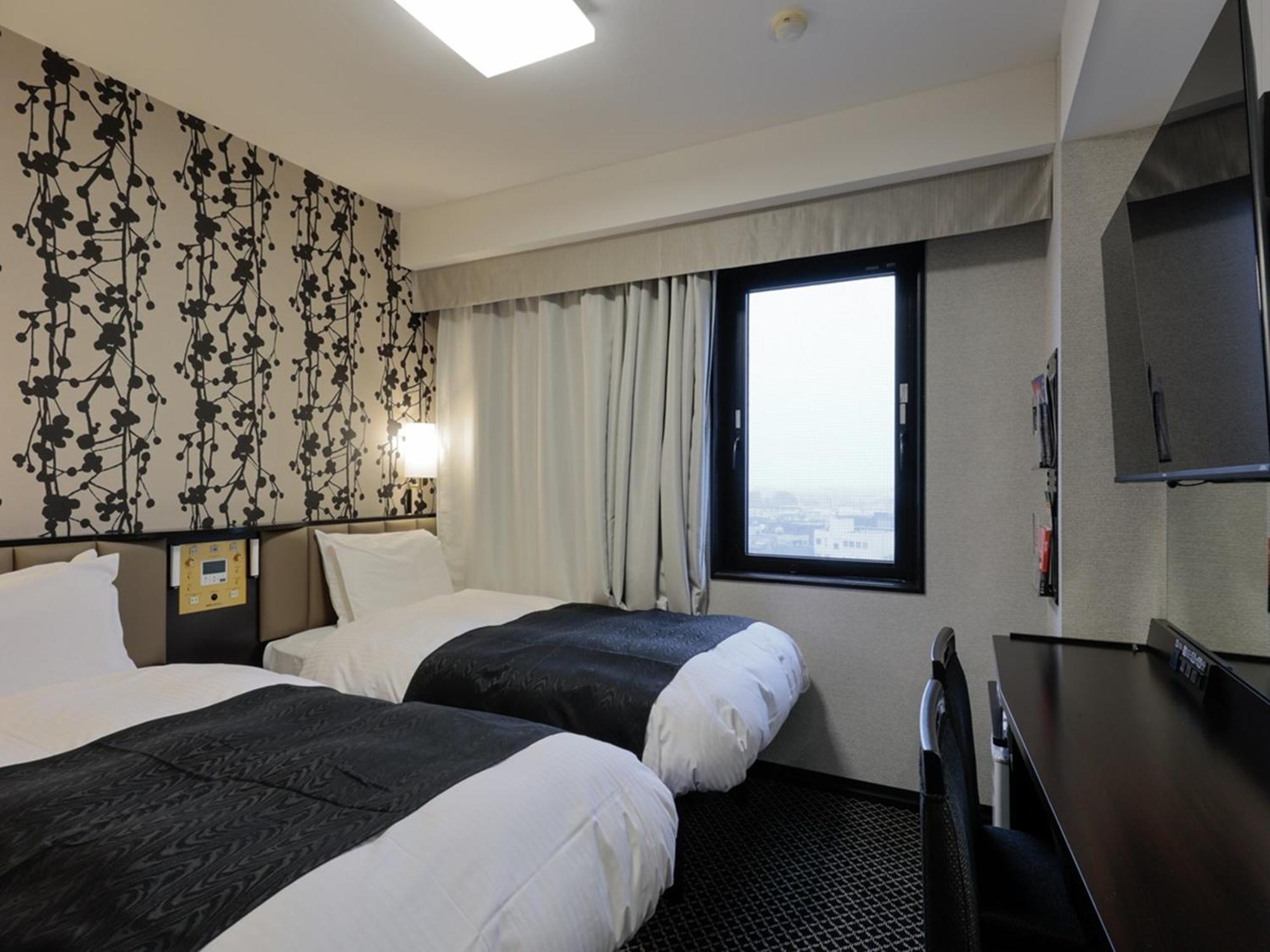 Apa Hotel Tonami Ekimae Kültér fotó