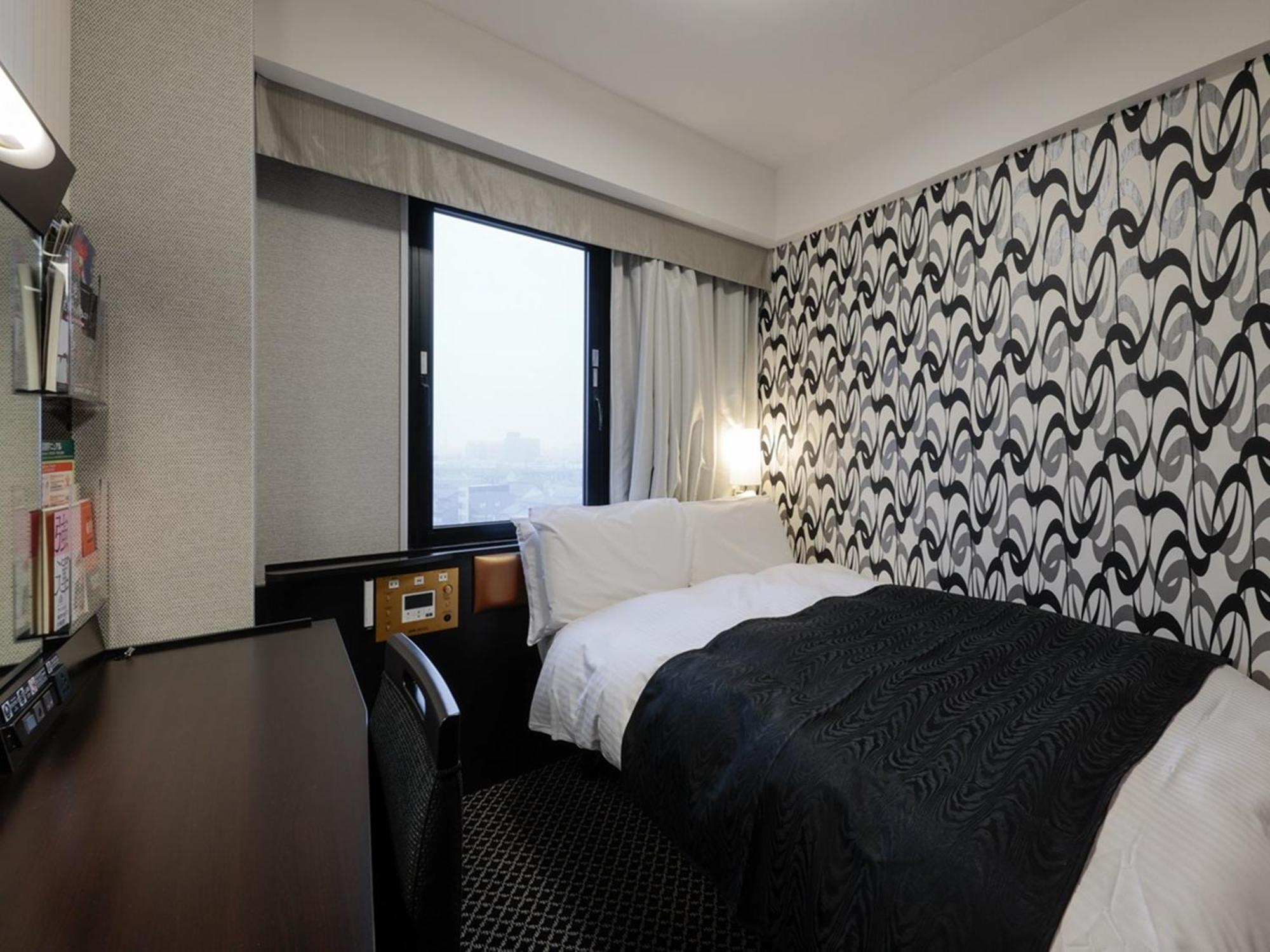 Apa Hotel Tonami Ekimae Kültér fotó