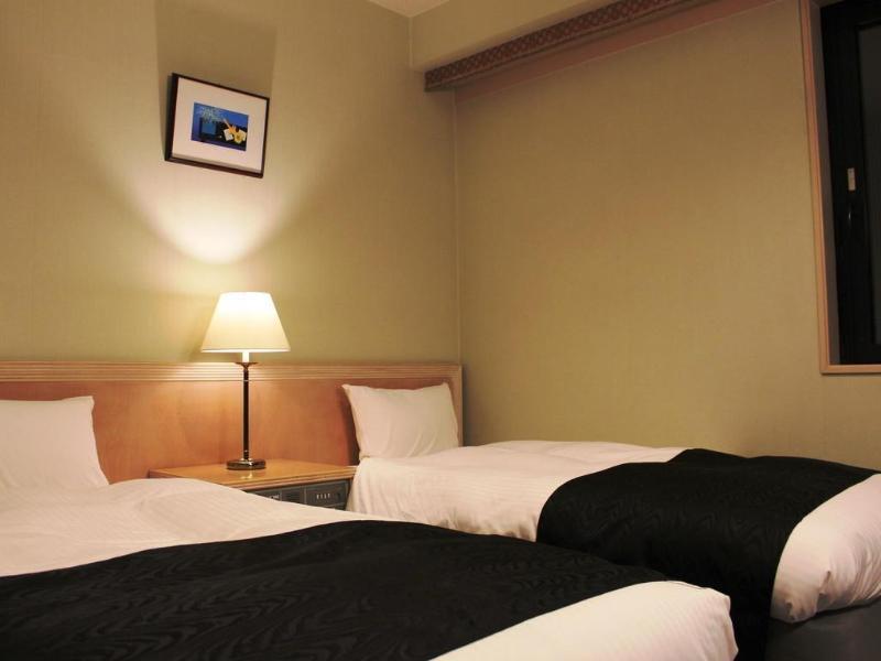 Apa Hotel Tonami Ekimae Kültér fotó