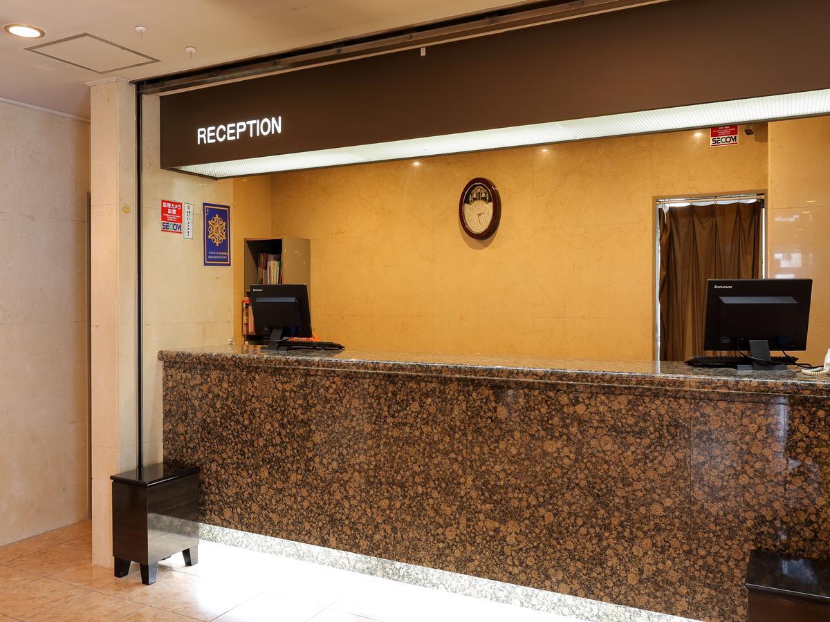 Apa Hotel Tonami Ekimae Kültér fotó